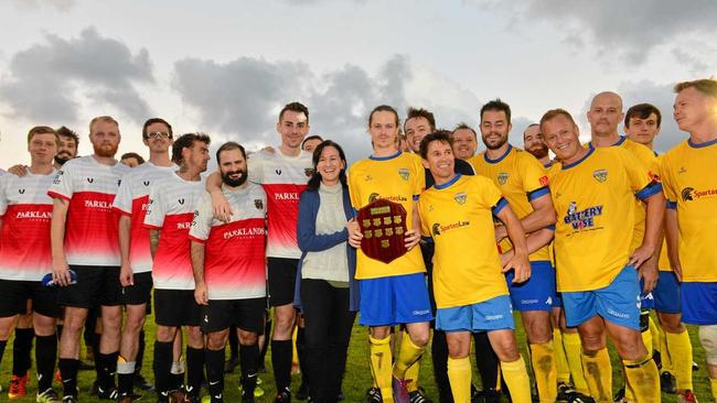 IN HIS HONOUR: The Caloundra and Kawana Football Clubs unite for the inaugural Lachlan Wells Charity Shield match. Lachlan's aunt Kristine Hanna (centre) spoke on the family's behalf. Picture: John McCutcheon