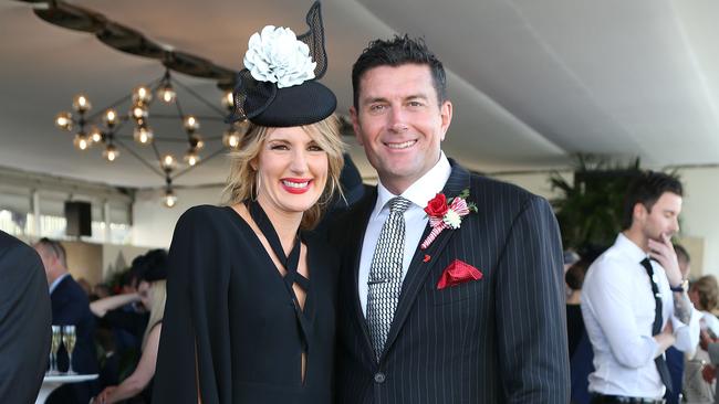 Seven News host Sharyn Ghidella and new 4BC Mornings host Bill McDonald in the Birdcage at the AAMI Stradbroke Day at Eagle Farm Racecourse. Pics Tara Croser.