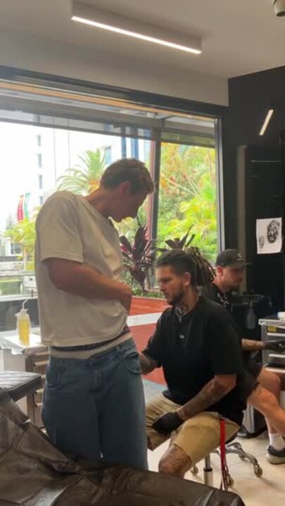 Dan Gorringe getting GC Suns tattoo