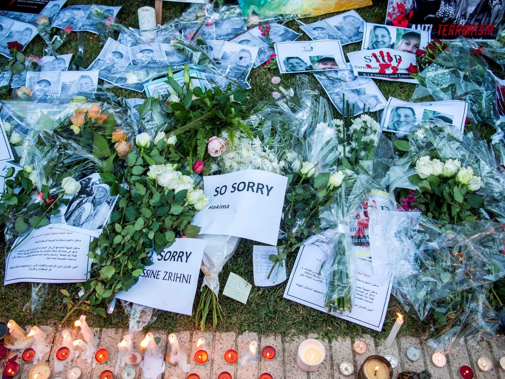 Moroccans pay tribute to the murdered Scandinavian tourists at a vigil in front the Norwegian embassy in Rabat on December 22. Picture: Fadel Senna/AFP