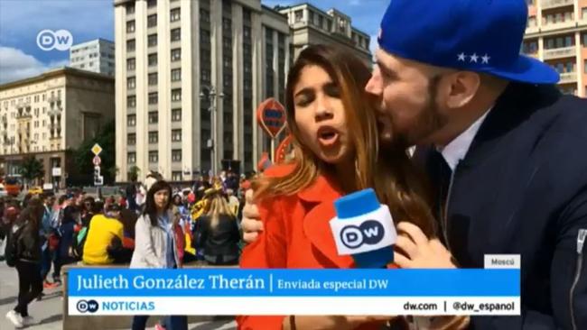 Gonzalez Theran tries to turn away from the man.