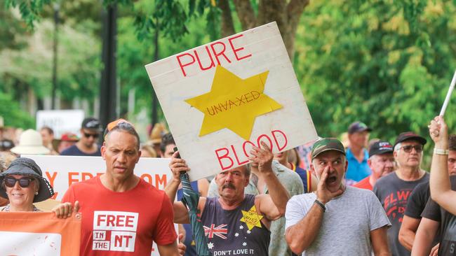 Protesters congregate at the Cenotaph at a Free in the NT march in Darwin. Picture: Glenn Campbell