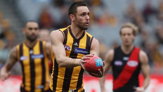 Jack Gunston puts Hawthorn into attack against Essendon.