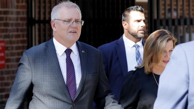 Prime Minister Scott Morrison and wife Jenny leave after the funeral service for Judy Baird on Monday. Picture: Toby Zerna