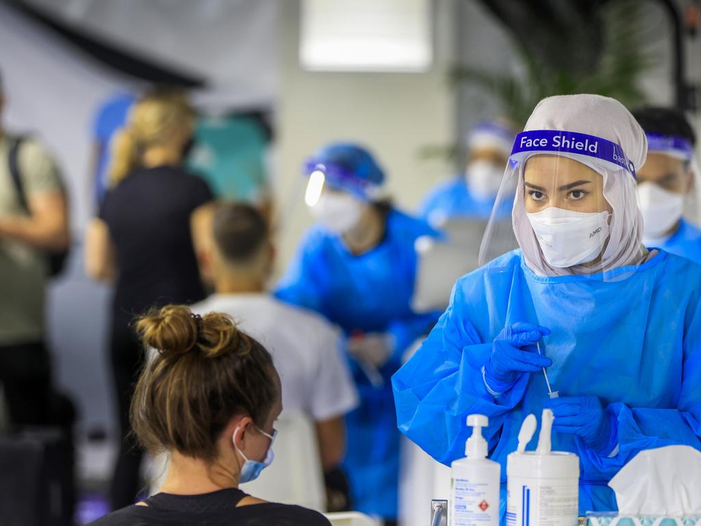 Travellers wait to be tested at Histopath’s pre-departure Covid testing clinic at Sydney International airport. Picture: Jenny Evans/Getty Images