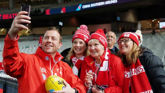 Steve Johnson, with Sydney Swans fans, was an assistant coach at the two AFL clubs in Sydney. Picture: AAP Image/Michael Dodge