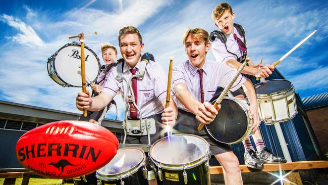 Cleveland District State High School drummers who will be able to combine their love of playing the drums and AFL when they get to play as backing drummers at this year's AFL grand final with band Sheppard at the Gabba: from left, Kobi Strand (year 8), Keegan Krueger (year 12), Will Higgins (year 11) and Lochlan Key (year 10). Pictures: NIGEL HALLETT