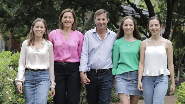 Deb Frecklington (second from left with her husband and children) says her children keep her “grounded” while the premier enjoys makeovers and expensive outfits. Pic Mark Cranitch.