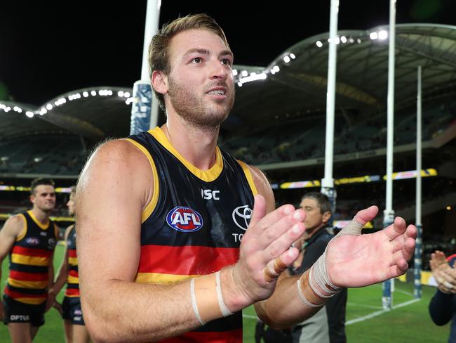 AFL  - Saturday, 19th September, 2020 - Adelaide Crows v Richmond at the Adelaide Oval. Adelaide's Daniel Talia leads the team off in the last game of the year and his 200th game Picture: Sarah Reed