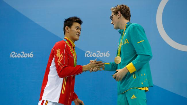 Silver medallist Yang Sun of China and gold medal medallist Mack Horton of Australia pose during the medal ceremony for the Final of the Men's 400m Freestyle on Day 1 of the Rio 2016 Olympic Games / Getty Images