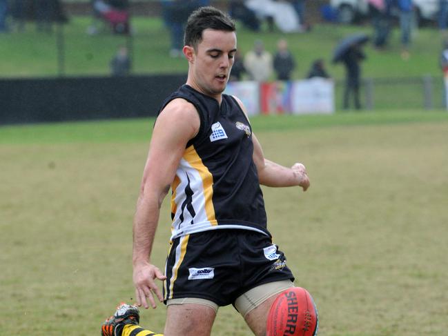 A regular sight in the EFL: Luke Barker lining up for goal.