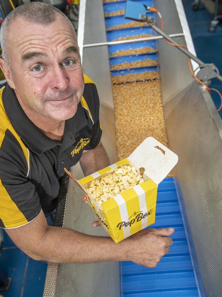 Mark Adamson with the Pop Box popcorn produced in Toowoomba. Picture: Nev Madsen