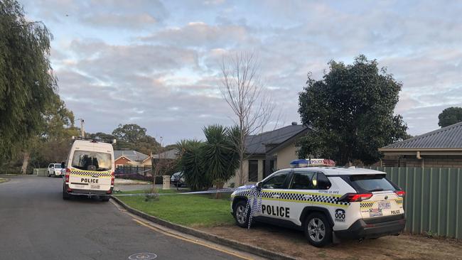 Police vehicles remained at Campbelltown to cordon off the area on Sunday.