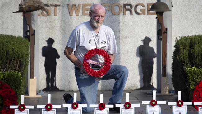 Mic Noble at the Logan war memorial, where the service was cancelled but he organised a video tribute. (AAP/Image Sarah Marshall)