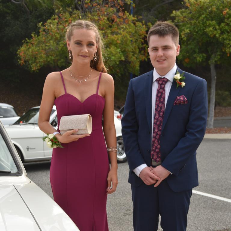 Aaron Yea (right) at his school formal, he was named Gladstone’s Young Citizen of the Year for 2022.