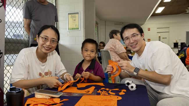 Chen family enjoys a day of fun and activities at a special Harmony Day celebration at the Malak Community Centre as part of the Fun Bus program. Picture: Pema Tamang Pakhrin