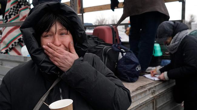 Evacuees from Mariupol arrive at a shopping centre on the outskirts of the city of Zaporizhzhia to register as displaced people on March 16. Picture: AFP