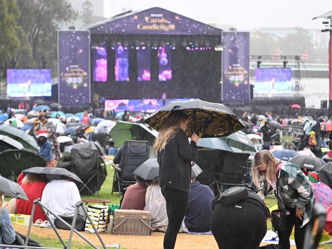 Rain at the Sealink Carols By Candlelight in Elder Park, Tarntanya, Kaurna Yarta, Adelaide on Sunday, December 11, 2022. (The Advertiser/ Morgan Sette)