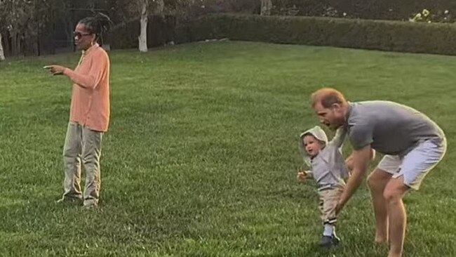 Harry and Archie play in the garden with Meghan’s mum. Picture: Netflix