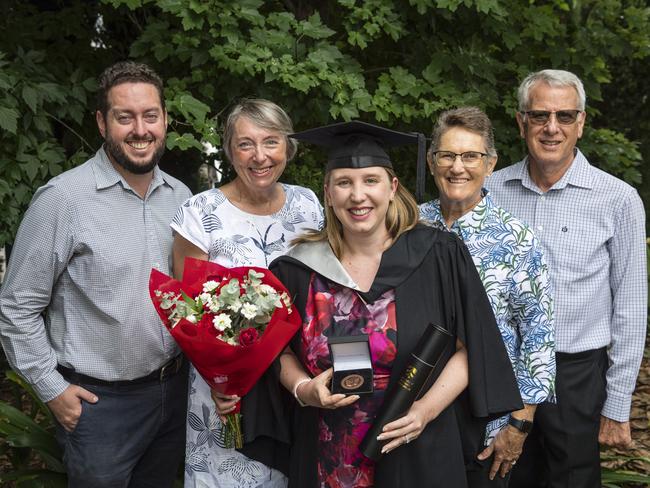 Bachelor of Business graduate Patricia Evans shows her Faculty Medal to family (from left) Russell Evans, Mary-Ellen Evans, Susan Drew and Richard Drew at a UniSQ graduation ceremony at Empire Theatres, Tuesday, February 13, 2024. Picture: Kevin Farmer