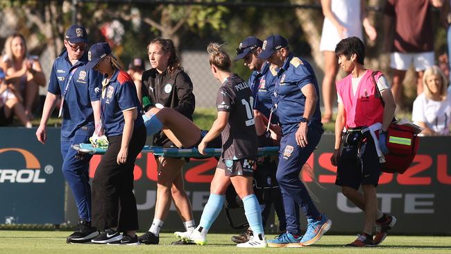 Holly McNamara leaves the field on a stretcher. Picture: Getty Images