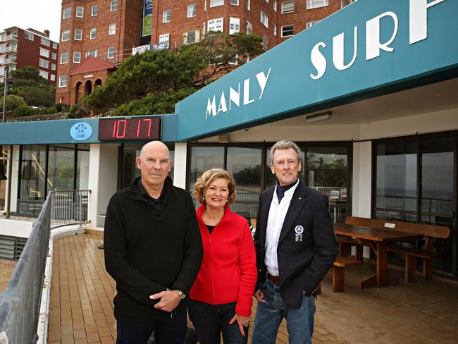 President Chris Bell, Cr Candy Bingham and former president of Manly LSC Tony Bonner in front of the club. Picture: Adam Yip.