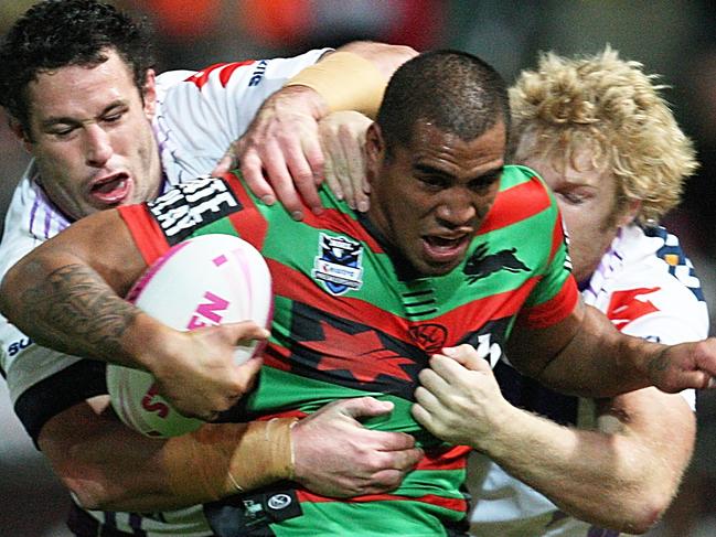 Eddy Pettybourne is tackled by Brett White during the NRL Round 14 South Sydney Rabbitohs v Melbourne Storm match in Perth, Saturday, June 13, 2009. (AAP Image/Action Photographics, Colin Whelan) NO ARCHIVING, EDITORIAL USE ONLY