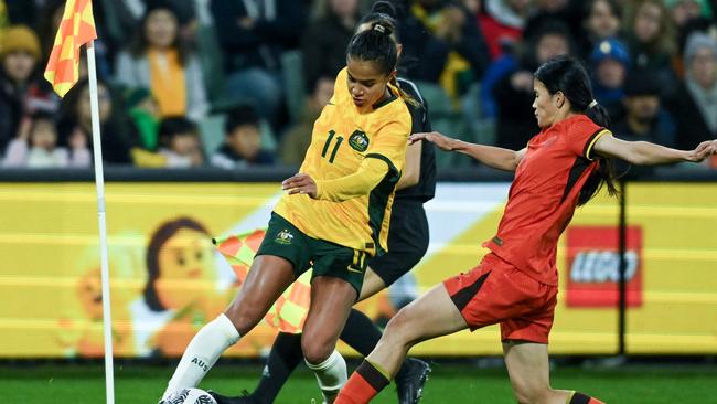 ADELAIDE, AUSTRALIA - MAY 31: Mary Fowler of Australia    competes with Chen Qiaozhu of China PR during the international friendly match between Australia Matildas and China PR at Adelaide Oval on May 31, 2024 in Adelaide, Australia. (Photo by Mark Brake/Getty Images)