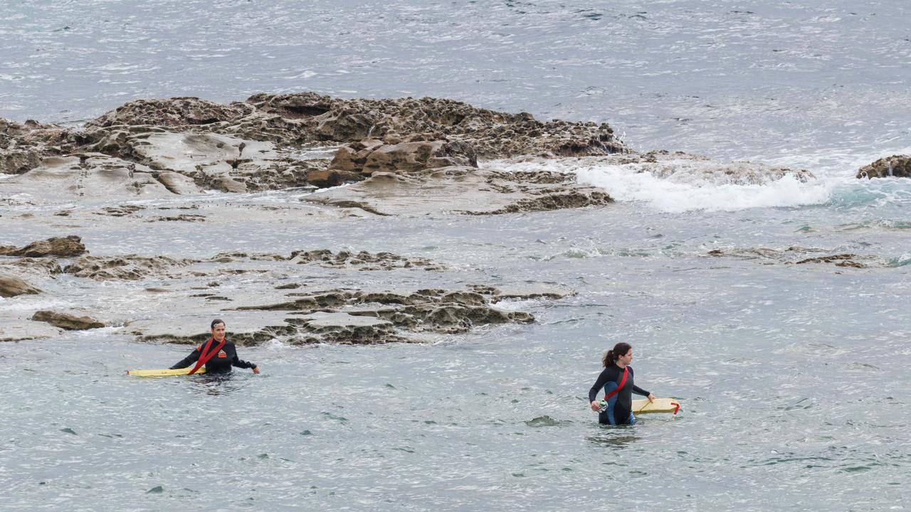 The 11-year-old boy was swept out to sea while wading across the channel at The Entrance. Picture: NewsWire / Max Mason-Hubers