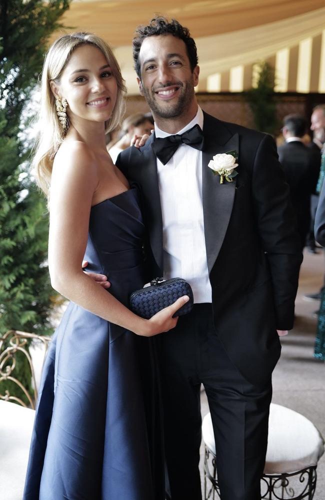 Heidi Berger and Daniel Ricciardo in front of the camera.