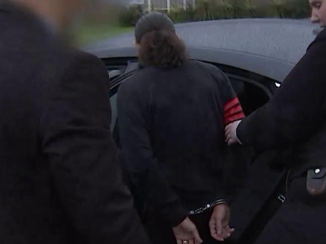 A man is seen in police custody following an investigation into shots fired during an altercation in Alpha Street, Chester Hill about 9.30pm, Sunday, August 9, 2020., Picture: NSW Police Force