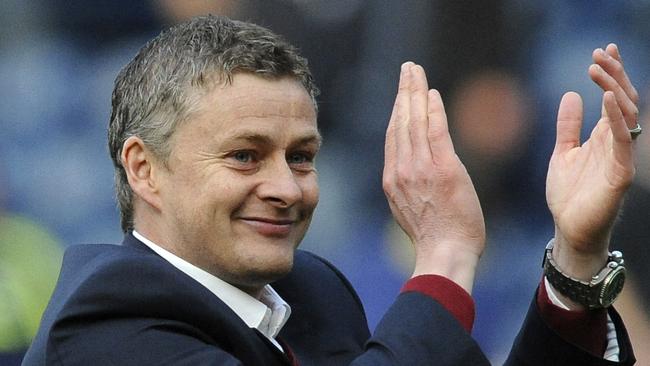 FILE - In this Saturday, March 29, 2014 file photo, Cardiff manager Ole Gunnar Solskjaer applauds fans after the English Premier League soccer match between West Bromwich Albion and Cardiff City at Hawthorns Stadium in West Bromwich, England. Manchester United announced Wednesday Dec. 19, 2018, they have hired Ole Gunnar Solskjaer as its manager until the end of the season, bringing the Norwegian back to the club 20 seasons after he scored its winning goal in the Champions League final. (AP Photo/Rui Vieira, File)