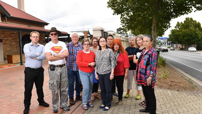 Vivien Loo (centre) outside her property with other residents set to be affected by a $98 million Portrush and Magill Rd intersection upgrade. Picture: AAP/ Keryn Stevens.