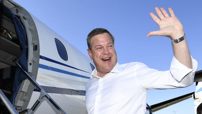 Queensland LNP leader Tim Nicholls boards a charger flight to make his way north. Picture: Dave Hunt/AAP