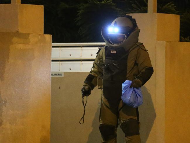 A bomb squad police officer at work at the apartments’ entrance. Picture: Yuri Kouzmin