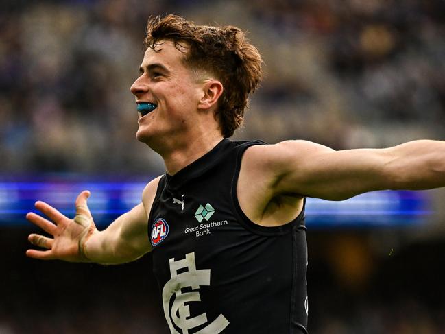 PERTH, AUSTRALIA – AUG 18: Jaxon Binns of the Blues celebrates a goal during the 2024 AFL Round 23 match between the West Coast Eagles and the Carlton Blues at Optus Stadium on August 18, 2024 in Perth, Australia. (Photo by Daniel Carson/AFL Photos via Getty Images)