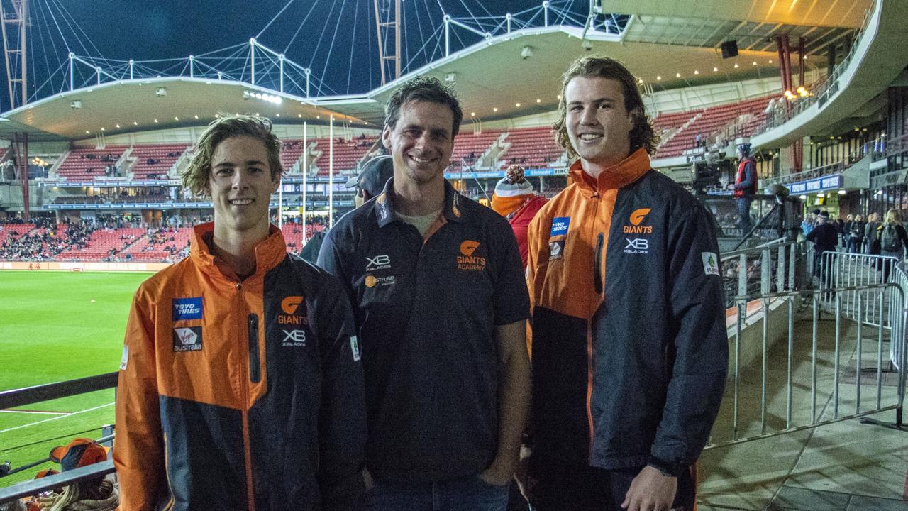 Giants academy members James Peatling (left) and Kieren Briggs (right) as teenagers with longtime academy head Jason Saddington. Picture: GWS Giants