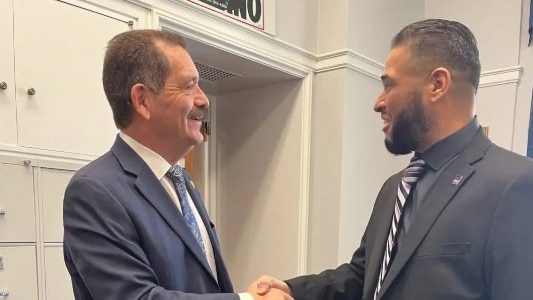 Eric Rodriguez, father of suspected terrorist Elias, with Chicago Congressman Chuy Garcia in March. Picture: Instagram/@seiuhcii