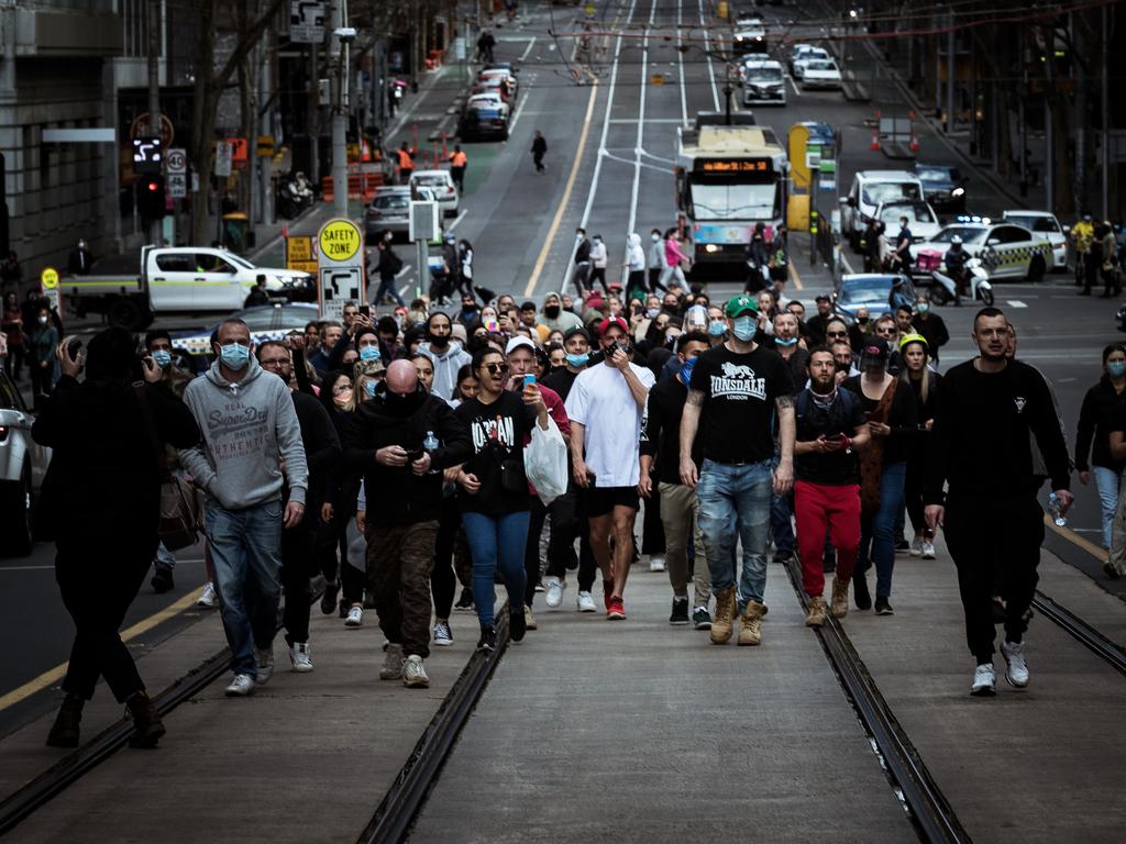 Protesters walk through the streets of the city on September 13, 2020. Picture: Darrian Traynor/Getty Images