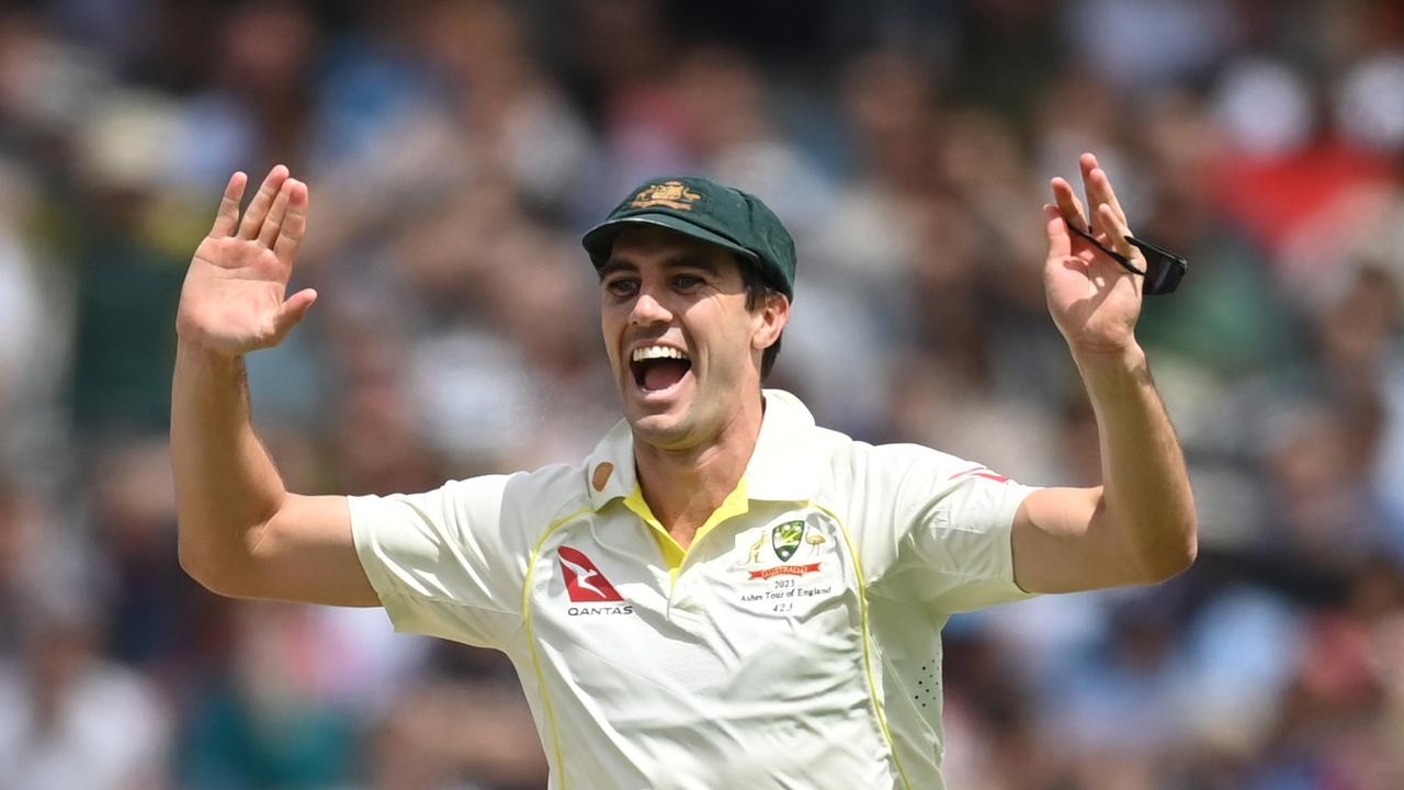 Pat Cummins celebrating the wicket. Photo by Gareth Copley/Getty Images