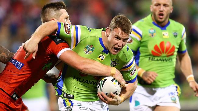 CANBERRA, AUSTRALIA — JULY 14: Luke Bateman of the Raiders is tackled during the round 19 NRL match between the Canberra Raiders and the St George Illawarra Dragons at GIO Stadium on July 14, 2017 in Canberra, Australia. (Photo by Mark Nolan/Getty Images)