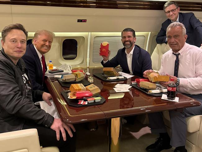 Donald Trump, Elon Musk, Donald Trump Jr and Robert F. Kennedy Jr eat McDonald’s on Trump Force One. Picture: X/DonaldJTrumpJr