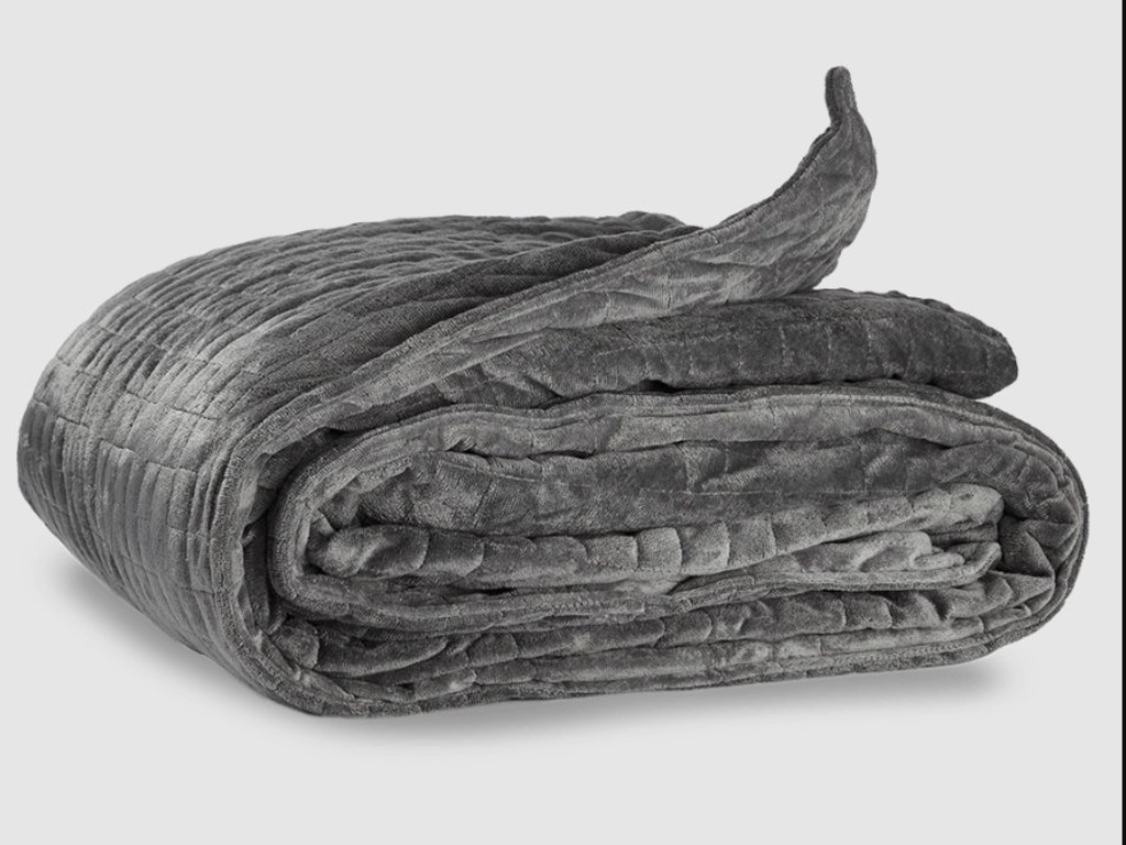 Shop a weighted blanket - perfect for TV nights.