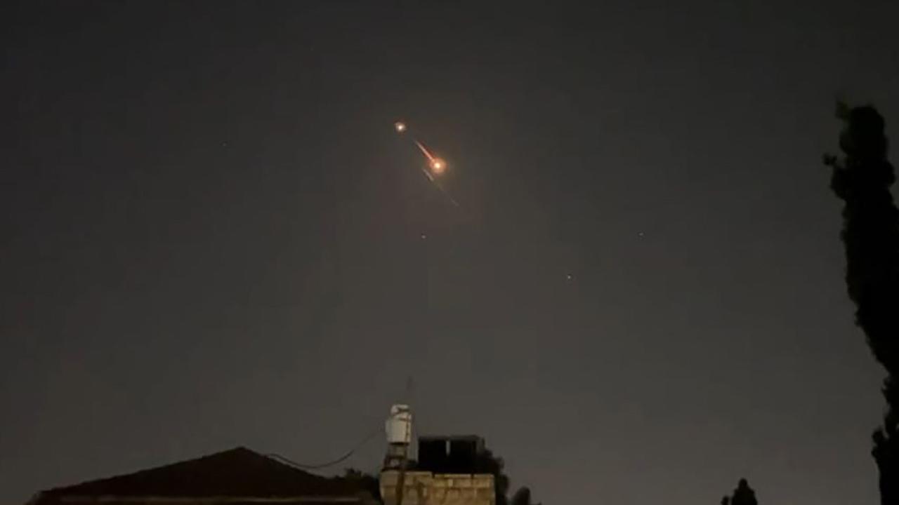 Explosions lighting up Jerusalem sky during on April 14. Picture: AFPTV/AFP