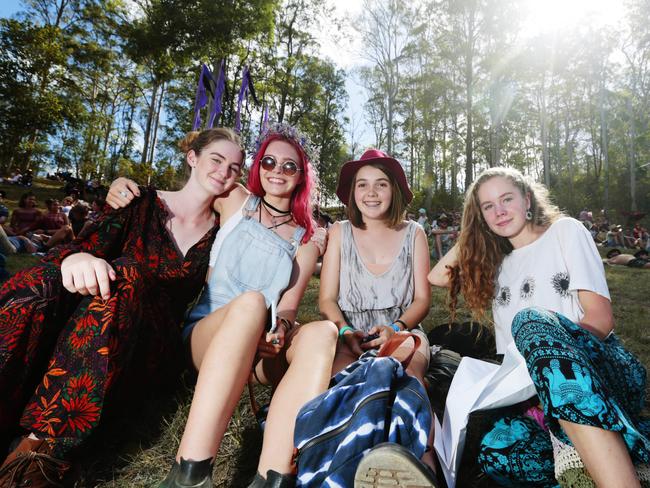 Noosa girls Isabella Rae-Argo, Lauren Hancock, Alex Lownie and Echo Hunter-Demecs chill on the hill on opening day at Woodford Folk Festival 2016. Photo Lachie Millard