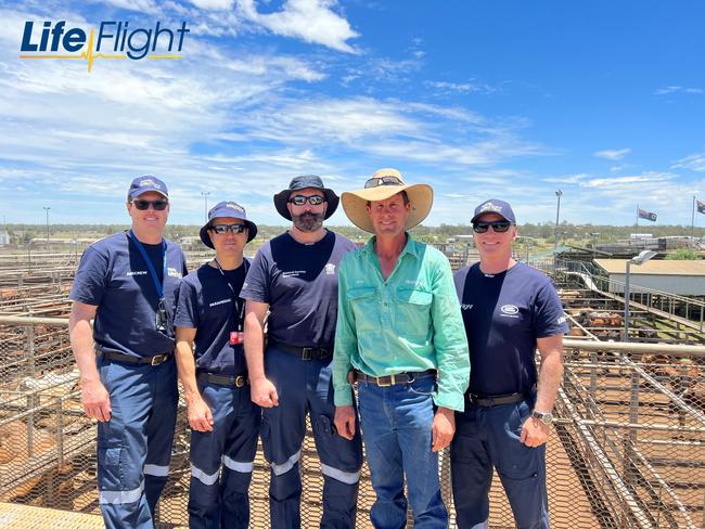 (Left to right) LifeFlight pilot Russell Procter, Flight paramedic Brad Solomon, Critical Care Doctor Gareth Richards, Roma farmer Chris Skelton, and LifeFlight pilot David Rockwell. Picture: LifeFlight.