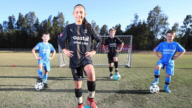 Getting ready for the Premier Invitational soccer tournament being livestreamied on Friday are from left, Remi Begovic U8s, Akira Booth U12s, Xavi McGrath-Serramalera U11/12s and Levi Murphy U8s. Picture Glenn Hampson