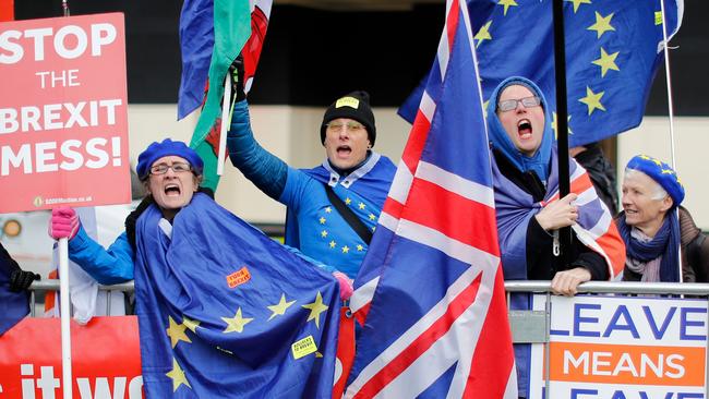 Anti-Brexit supporters demonstrate outside the UK Houses of Parliament days before the vote. Picture: Tolga Akmen