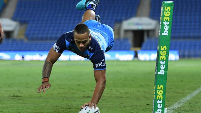 Phillip Sami of the Titans scores a try during the NRL match between the Gold Coast Titans and the Canberra Raiders. Photo: AAP