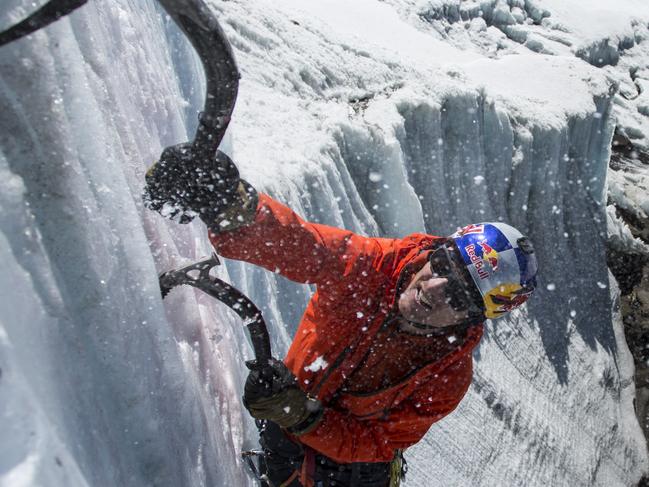 Will Gadd ice climbing near the summit at 19,000 feet on the glacier ice on Mount Kilimanjaro in Tanzania, Africa on October 30, 2014. // Christian Pondella/Red Bull Content Pool // P-20150109-00091 // Usage for editorial use only // Please go to www.redbullcontentpool.com for further information. //